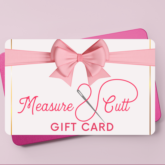 Gift card with Measure and Cutt Logo  on a light pink background