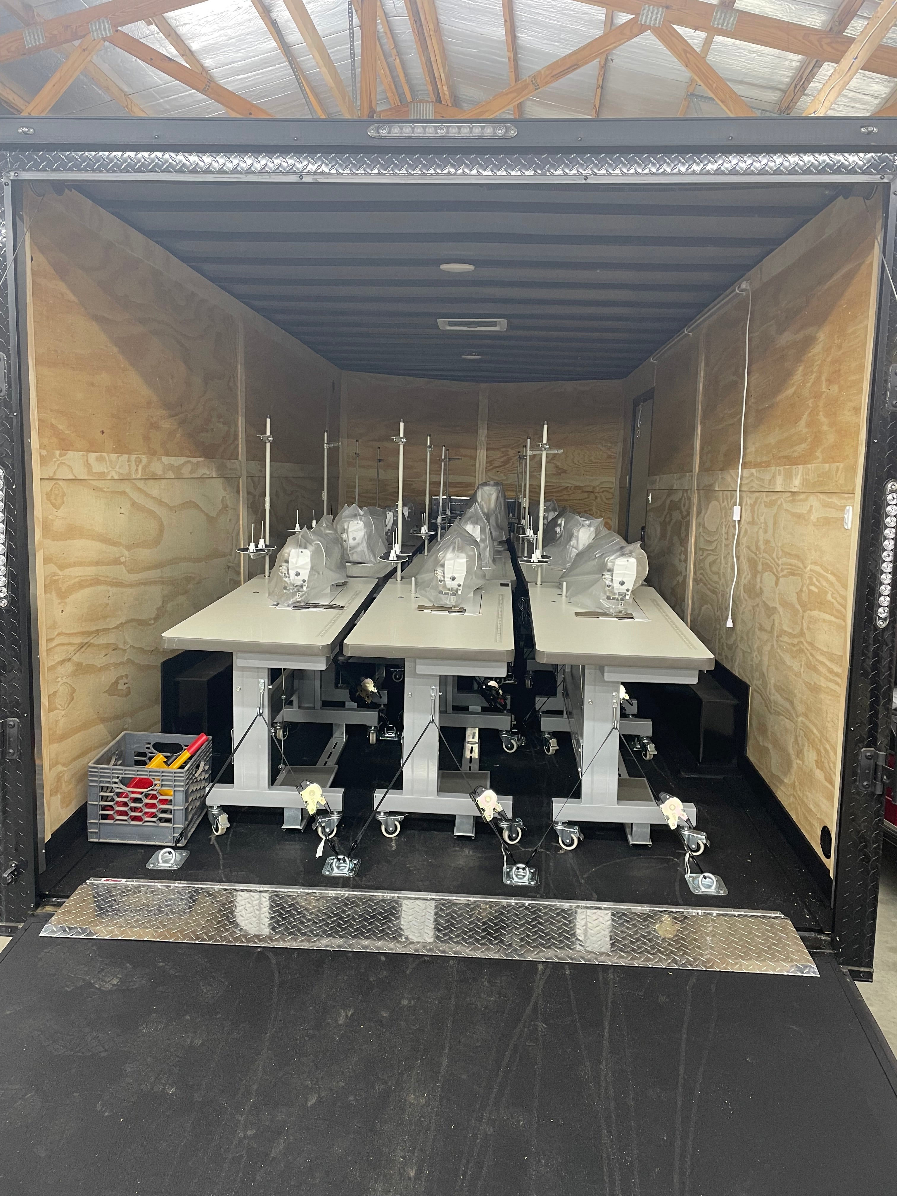 Measure and Cutt Truck deliverying sewing machines to an event