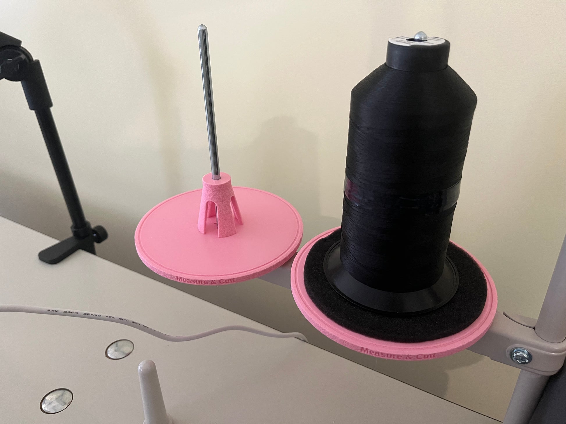 Thread Stand Spool Holders in Pink shown with thread