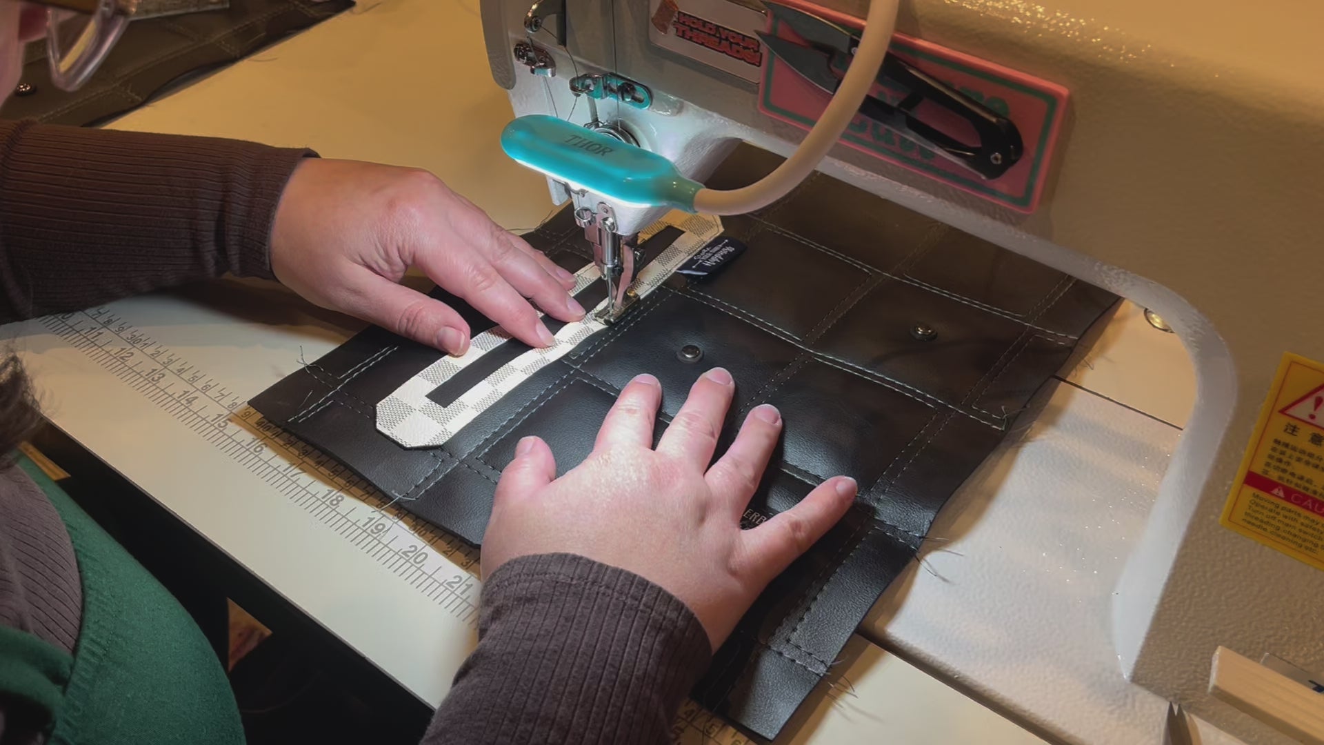 Load video: Short video of a bag being sewn on an industrial sewing machine 